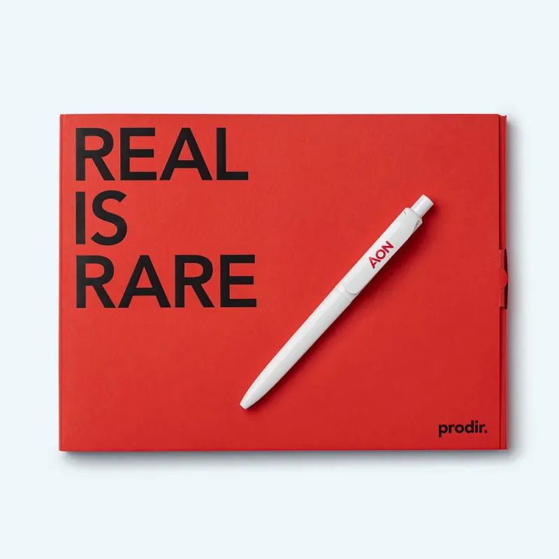 AON book with pen tabletop shot