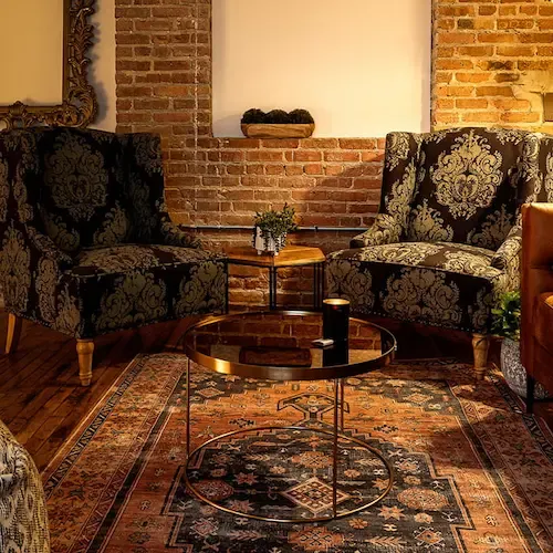 The Zimmerman Photo client area in West Town, Chicago: a warmly lit lounge space adjoining the shooting studio.
