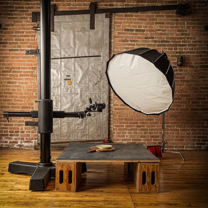 A shooting set inside the Zimmerman Photo studio in West Town, Chicago, with lighting and backdrop ready for a product shoot.