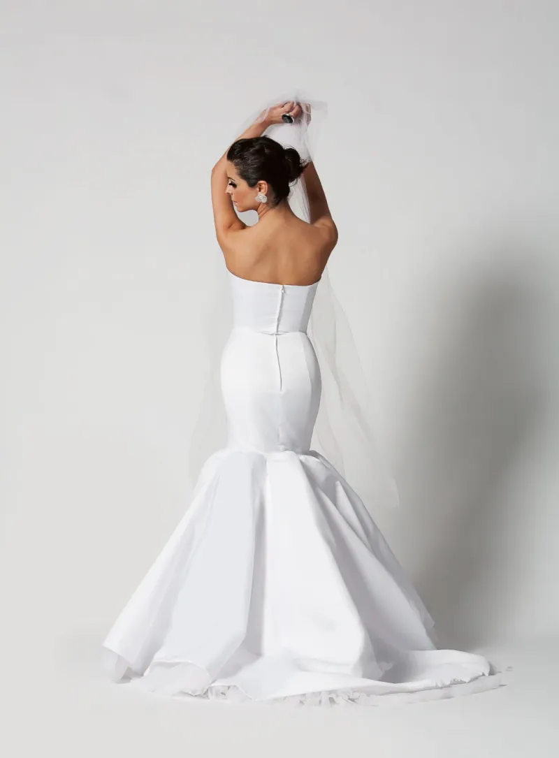 White wedding dress side view on white background, softgoods photography