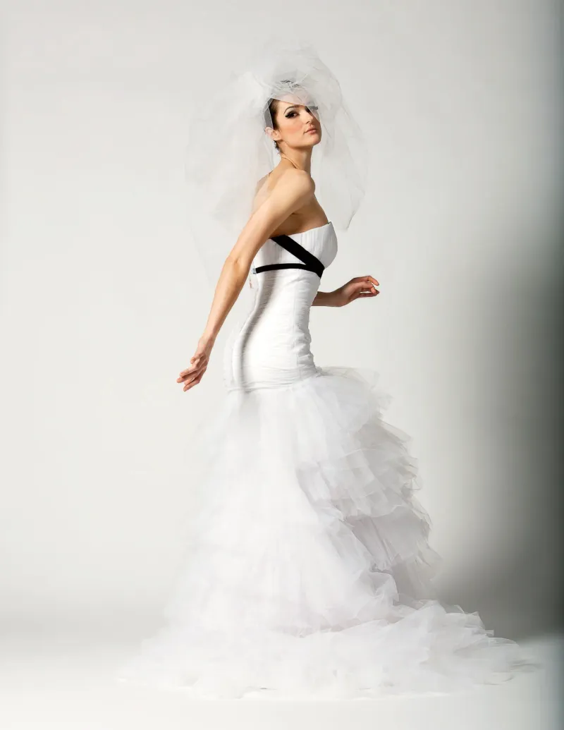 White wedding dress detail on white background, softgoods photography