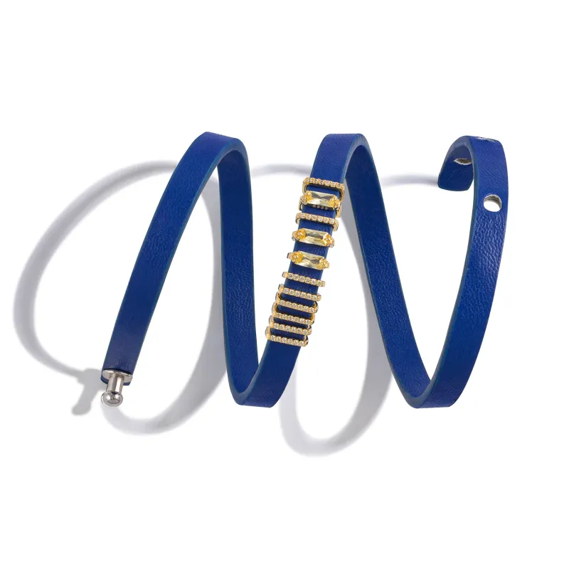 Blue leather bracelet on white background