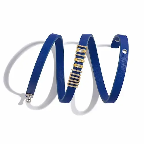 Blue leather bracelet on white background
