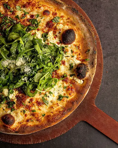 Example flat-lay shot: overhead styled pizza composition
